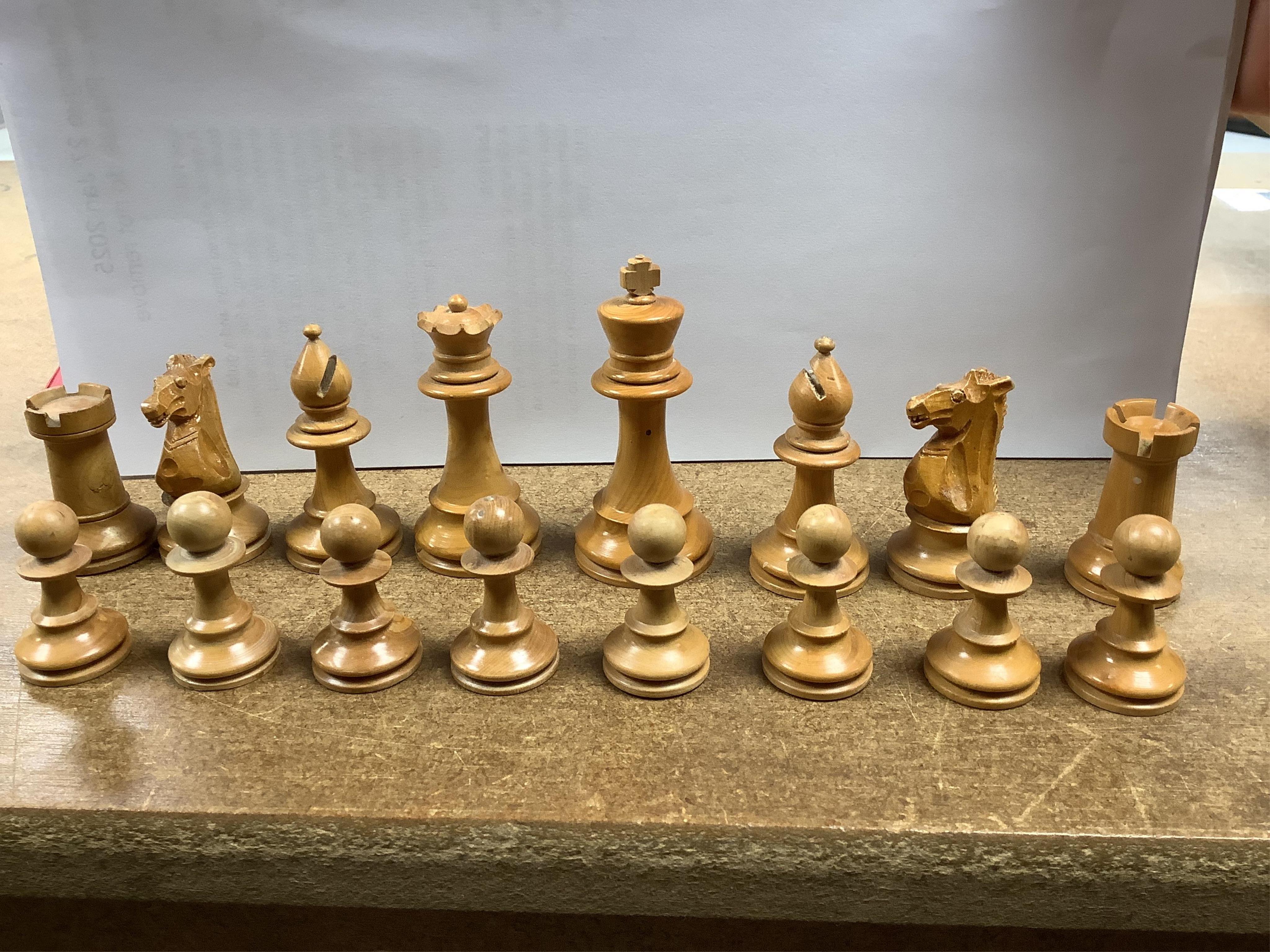 A chess set, possibly F H Ayres, in a mahogany box, and another larger weighted chess set, in box, Ayres Kings 6cm. Condition - good